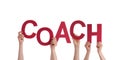 Hands Holding Coach Royalty Free Stock Photo