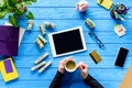 Hands holding coffee cup on blue wooden table by money Royalty Free Stock Photo