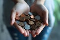 Hands Holding Coins