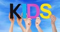 Hands Holding Colorful Straight Word Kids Blue Sky