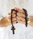 Hands holding cross prayer faith in christianity religion Royalty Free Stock Photo