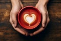 Hands holding a cup of coffee with heart foam latte art . Ai Generate Royalty Free Stock Photo