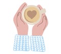 Hands holding cup of coffee with heart shape inside Royalty Free Stock Photo