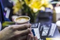 Hands Holding Cup of Coffee with Heart Shape Royalty Free Stock Photo