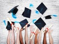 Hands Holding Diplomas And Throwing Hats Royalty Free Stock Photo