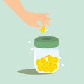 Hands holding dollar coins and putting in jar for save money. Royalty Free Stock Photo