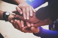 Diverse group of people holding hands in supportive gesture Royalty Free Stock Photo