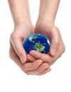 Hands holding earth