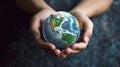 Hands holding Earth globe, as a symbol for environmental protection and care Royalty Free Stock Photo