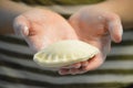 Hands Holding an Empanada Royalty Free Stock Photo