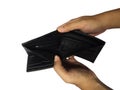 Hands Holding an Empty Black Wallet on White Background Royalty Free Stock Photo