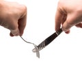 Hands holding empty fork and knife Royalty Free Stock Photo