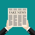 Hands holding fake news newspaper flat style Royalty Free Stock Photo