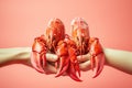 Hands holding fresh lobster on pastel background, fresh food ingredients, Healthy food