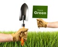 Hands holding garden trowel and sign Royalty Free Stock Photo