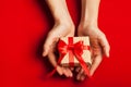 Hands holding a gift