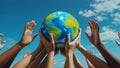 hands holding a globe together Royalty Free Stock Photo