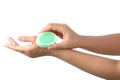 Hands holding herbal soap isolated on white with clipping path.