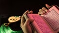 The Holy book of muslims/ Quran hands hold the koran Royalty Free Stock Photo