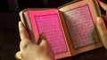 The Holy book of muslims/ Quran hands hold the koran Royalty Free Stock Photo