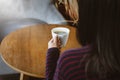 Hands holding hot cup of coffee or tea in morning Royalty Free Stock Photo