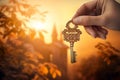 Hands holding house key. Hand with keys to the new house, real estate, mortgage, investment, rent, property concept. Home loan, Royalty Free Stock Photo