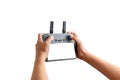 Hands holding an isolated drone controller with blank screen on white background, perfect for inserting custom UI or drone Royalty Free Stock Photo