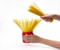 Hands holding jar with spaghetti inside Royalty Free Stock Photo
