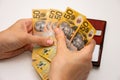 Hands holding leather wallet with australian dollars 50 banknotes. Finance and payment concept