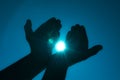 Hands holding light Royalty Free Stock Photo