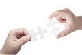 Hands holding matching jigsaw pieces Royalty Free Stock Photo