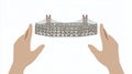 Hands Holding a Miniature Suspension Bridge - Concept of Engineering and Construction Royalty Free Stock Photo