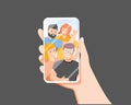 Hands holding mobile phone with happy boys and girls displaying on screen. Friends posing for selfie, joyful people Royalty Free Stock Photo