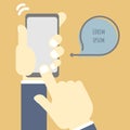 Hands holding mobile smart phone with touch screen and speech bubble Royalty Free Stock Photo