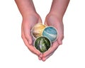 Hands holding nature themed globes Royalty Free Stock Photo