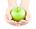 Hands holding out an apple Royalty Free Stock Photo
