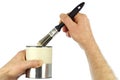 Hands Holding Paintbrush and Paint Can Royalty Free Stock Photo