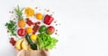 Hands holding a paper bag with healthy food Royalty Free Stock Photo