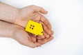 hands holding paper house, family home, homeless housing, mortgage crisis and home protecting insurance concept, foster