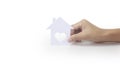 Hands holding paper house, family home  protecting insurance concept Royalty Free Stock Photo