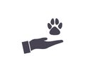 Hands holding paw icon. Animal welfare color icon. Pets care vector design and illustration.