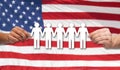 Hands holding people pictogram over american flag Royalty Free Stock Photo