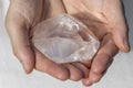 Hands holding piece of Quartz Royalty Free Stock Photo