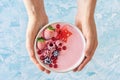 Hands Holding Pink Berry Yogurt Smoothie Bowl Royalty Free Stock Photo