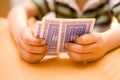 Hands Holding Playing Cards Royalty Free Stock Photo