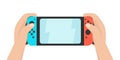 Hands holding portable gaming console. Royalty Free Stock Photo