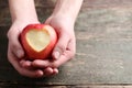 Hands holding red apple Royalty Free Stock Photo