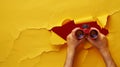 Hands Holding Red Binoculars.AI generated image Royalty Free Stock Photo