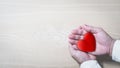 hands holding red heart, health care, love, organ donation, mindfulness, wellbeing, family insurance and CSR concept, world heart Royalty Free Stock Photo