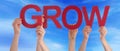 Hands Holding Red Straight Word Grow Blue Sky Royalty Free Stock Photo